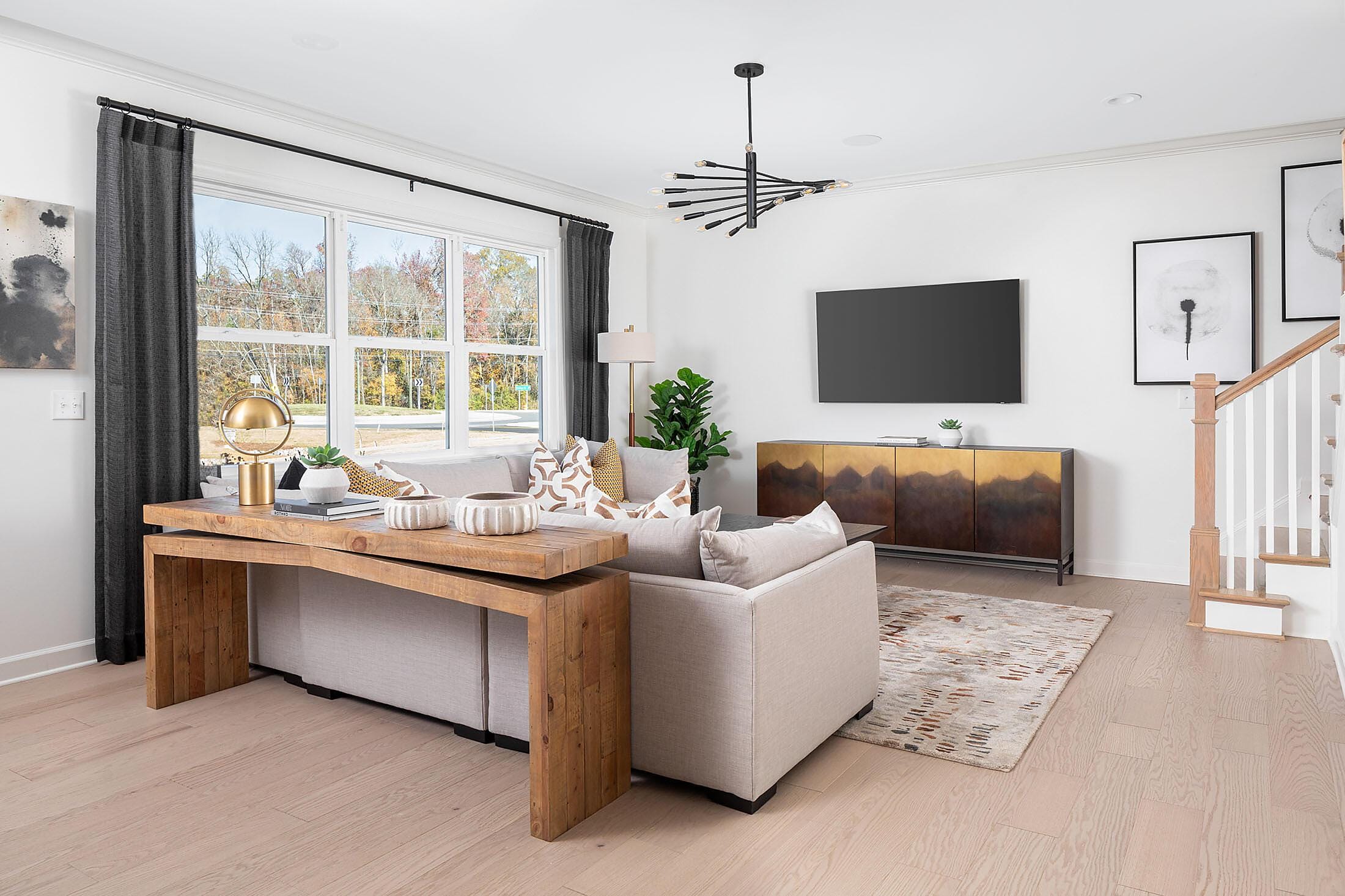 -home-empirecas-public_html-uploads-images-LowRise-Plans-Madison-car_cam_madison_family-room